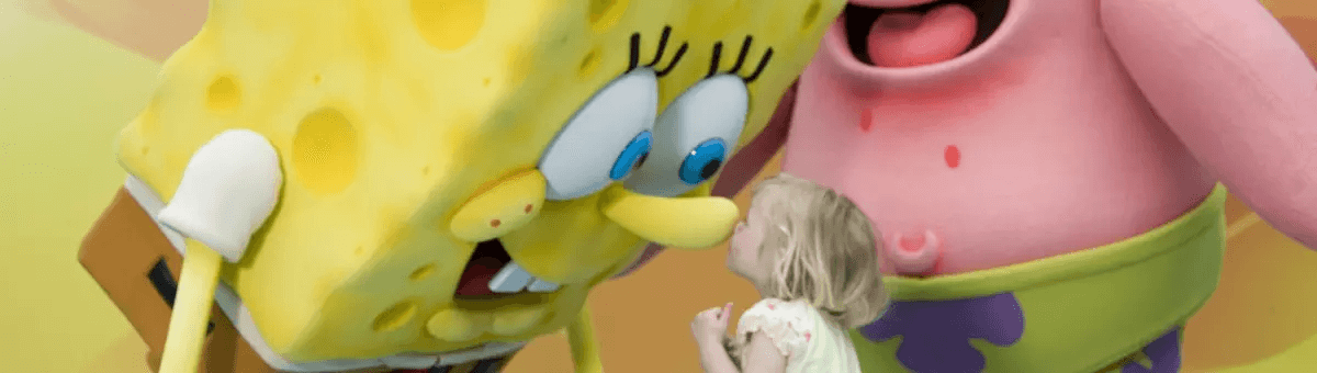 SpongeBob SquarePants greets a small child.